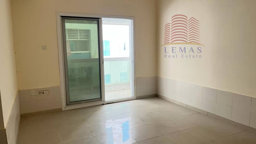 Empty 1 bhk partial city view  with  parking in Ajman pearl