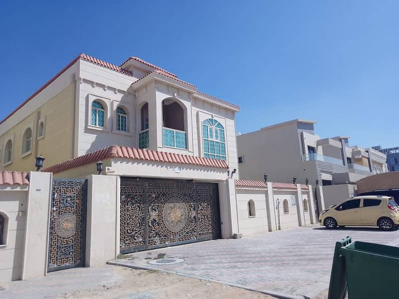 Villa for sale in the city of Ajman, Al Mowaihat area 2, the second piece of Sheikh Ammar Street, an area of ​​​​5600 feet