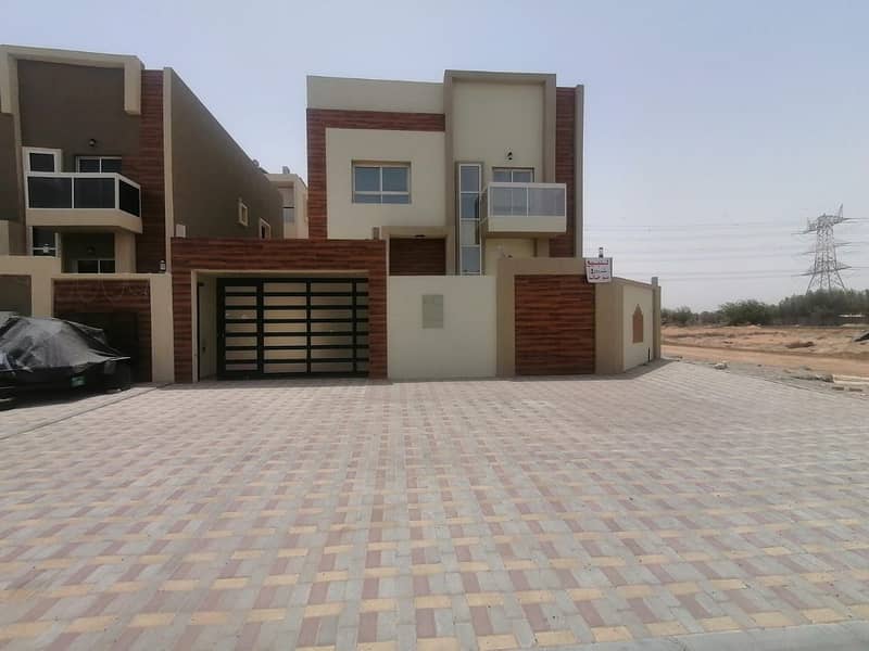 New villa for sale in Ajman, Al Helio area, freehold for all nationalities (Arab and non-Arab) without down payment.