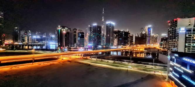 استوديو  للايجار في الخليج التجاري، دبي - شقة في برج السفير 2 الخليج التجاري 55000 درهم - 6025452