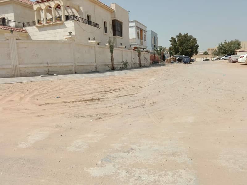 For sale in the Emirate of Ajman Al Rawda 3 plots of private residential land