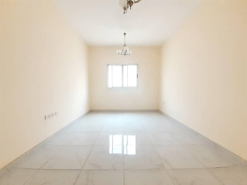 Like new brand 1bhk //31k//with 1parking wordroob in new muwaileh sharjah