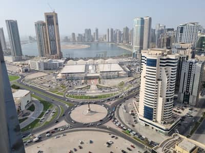 2 Bedroom Apartment for Sale in Al Taawun, Sharjah - An apartment with balcony charming open view of al Khan Lake