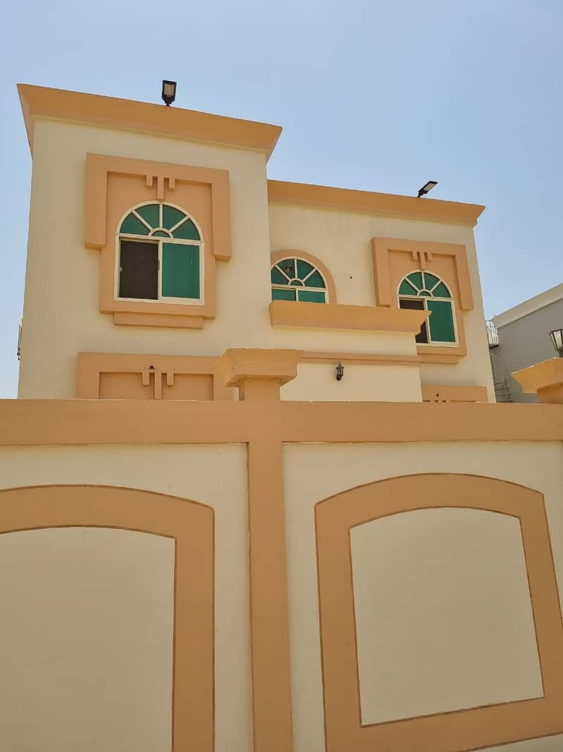 Villa for sale in Ajman, Al Rawda, an area of ​​3600 feet, 5 rooms, a council, a hall, and a hall