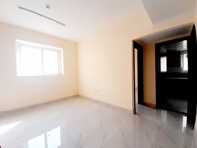LIKE NEW BULDING 1BHK HALL FAMILY HOME JUST 20k front of bass station Muwailah area
