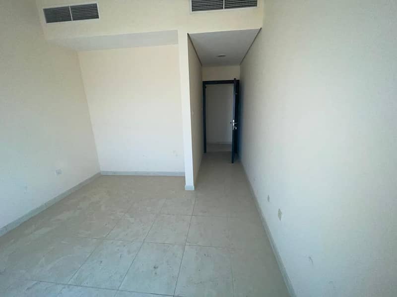 BIG BALCONY 2 BHK FOR SALE IN LLIES  TOWER 230,000/- WITH PARKING IN EMIRATES CITY AJMAN