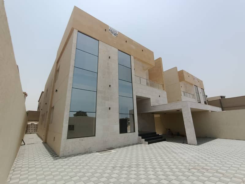 European design villa for sale in Al Mowaihat, super deluxe finishing, with the possibility of easy bank financing