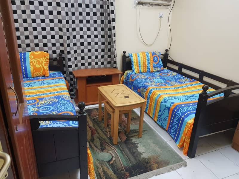 Sharjah Al Qasimia two rooms, a hall and 2 bathrooms, overlooking the main street, all rooms have a view available from today, the price is 3500 with
