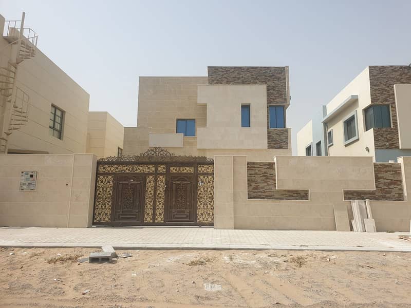 For sale a new villa with stone fronts in Al Rawda 1