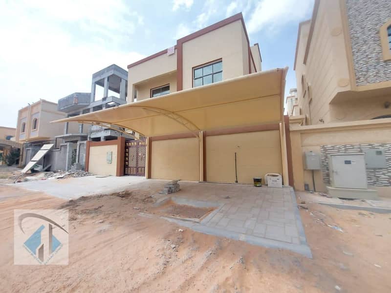 Villa for sale with high-end finishes, splendid architectural design, Alhadit owns a villa in a prime residential location in Ajman