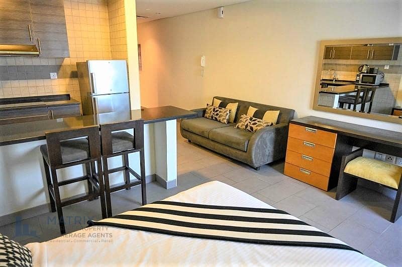 Cozy  Furnished studio  in the The Bridge Tower, Sports City