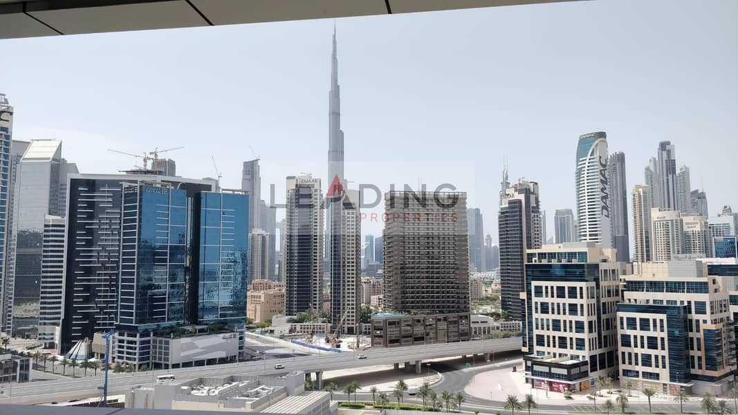 Two Bedroom Apartment with Maids Room avaialbe at business bay with Full Canal & Burj View