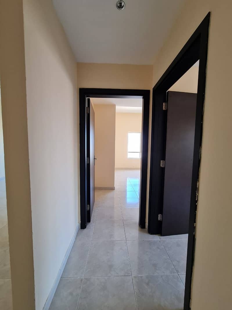 Two Bedroom Flat For Sale in Lake Tower C4 Emirates City Ajman