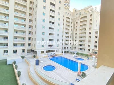 2 Bedroom Flat for Sale in Jumeirah Village Circle (JVC), Dubai - Pool View | Rented Unit | Cozy and Bright