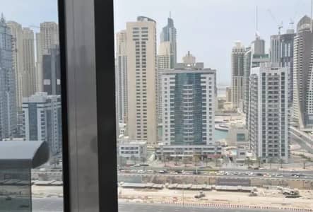 JLT Green lake tower 2 BHK with balcony Rented full lake view available for sale price AED 1.8 M