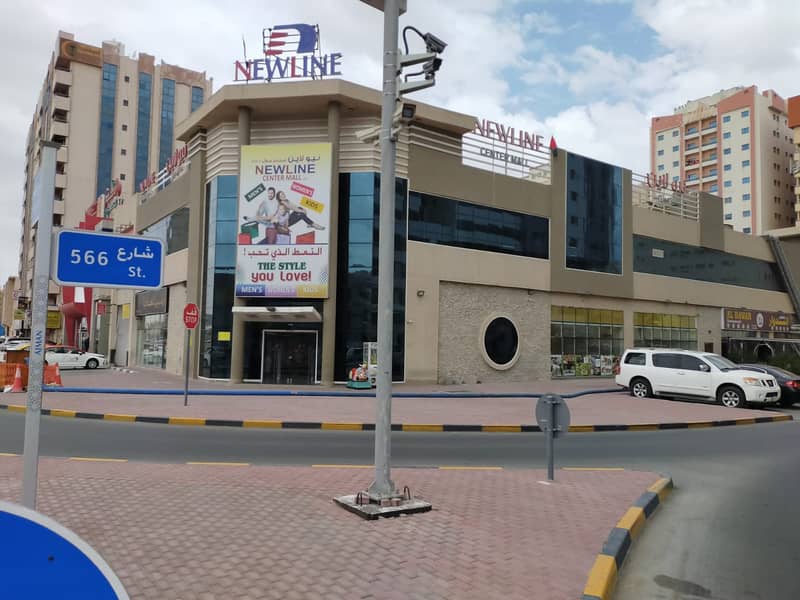 Showroom in Ajman, Al Ittihad Street, a very special vital location on three streets, with a car park