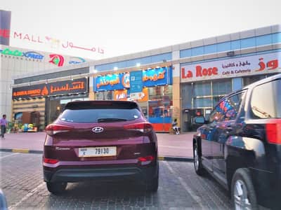 Mixed Use Land for Sale in Sheikh Khalifa Bin Zayed Street, Ajman - Great Opportunity For Investment | Shops + Open Land | For Sale  With  ROI | Free Hold | Ajman
