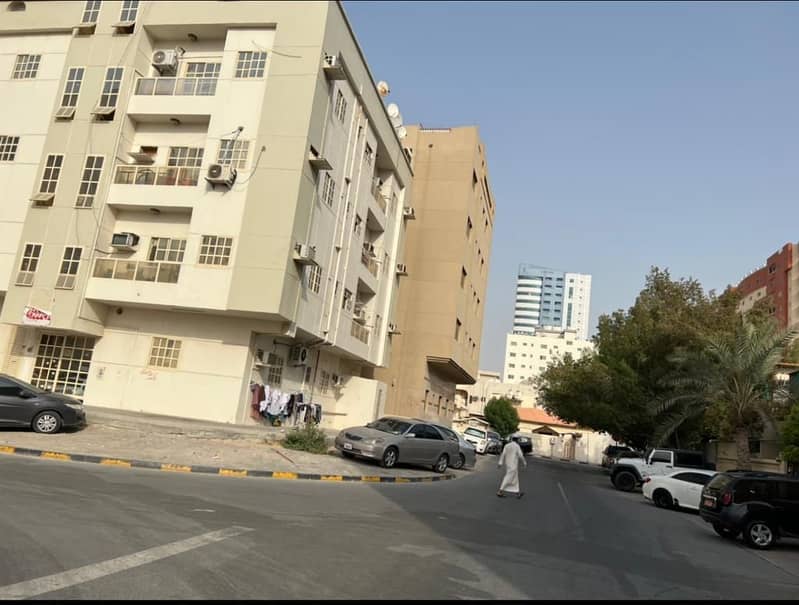 For sale a building in Al Nuaimiya, near the GMC Hospital, 16 apartment, included. In Qar Street.