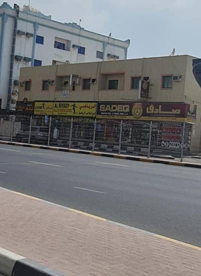 Building for Sale in Al Nuaimiya, Ajman - For sale a building on a main street in Ajman