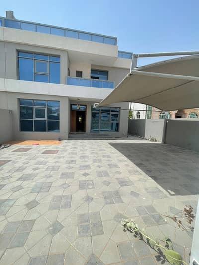 4 Bedroom Villa for Rent in Al Mowaihat, Ajman - A luxurious finishing villa in a privileged area for annual rent, an area of ​​4000 feet, 4 rooms, 2 councils, and a maid's room with a laundry room