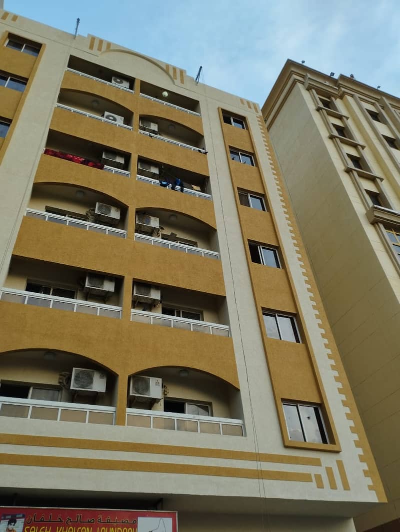For sale a residential and commercial building consisting of a ground floor and 6 floors in Ajman industria2