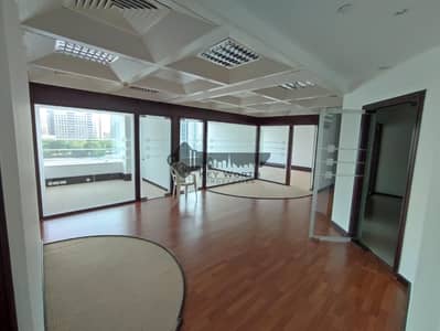 Office for Rent in Deira, Dubai - Bright Fully fitted glass partitioned office with 7 cabins