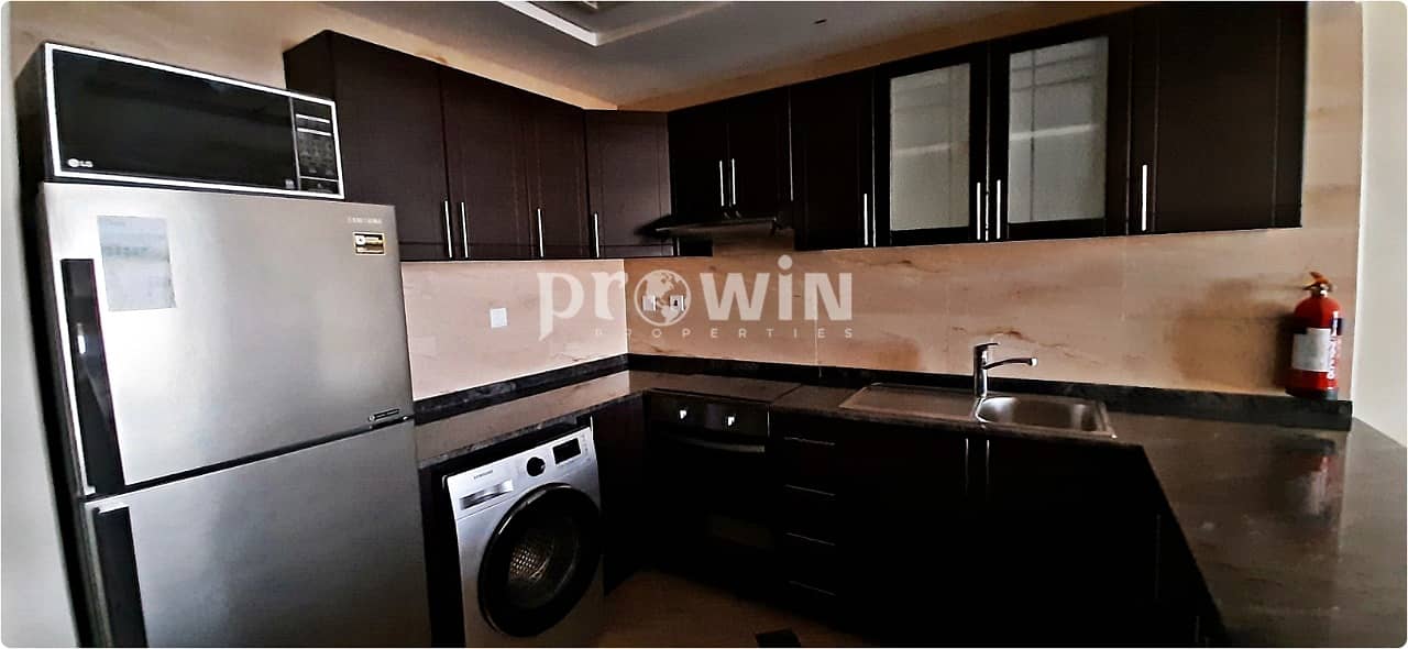 FULLY FURNISHED | HIGH FLOOR | DUBAI AUTODROME VIEW | CLOSED KITCHEN | FREEWAY FACING | CHILLER FREE | LIMITED UNITA