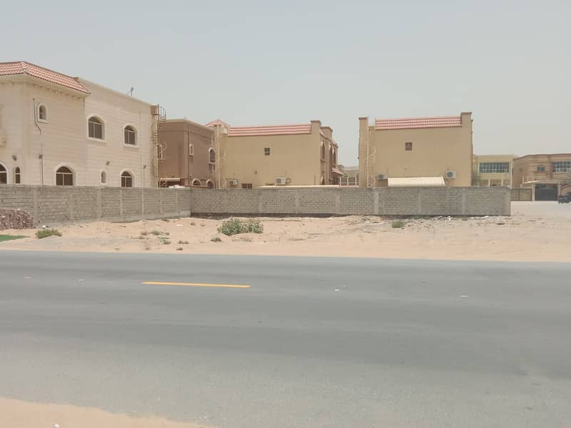 Own your land in the best areas of Ajman. Corner commercial land in Rawda 1 on Asphalt Street