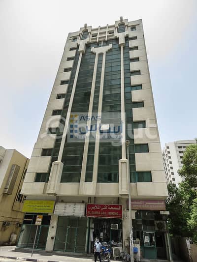 Shop for Rent in Abu Shagara, Sharjah - EXCLUSIVE OFFER 2 MONTH FREE FOR SHOPS  IN AL QOUS BUILDING