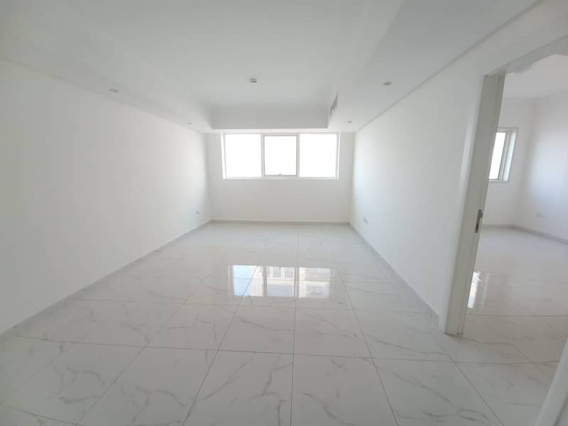 (Lavish building) 1bhk in 29k with parking new muwaileh 1 month free