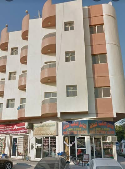 Building for Sale in Al Nuaimiya, Ajman - Residential and commercial Building with Good ROI for sale in Al Nuaimiya Ajman