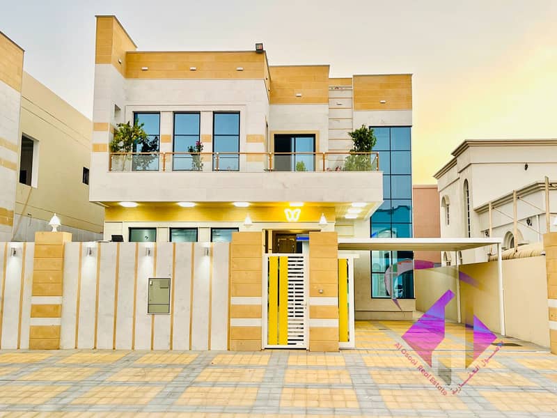 For sale, a modern villa in Ajman, wonderful finishing, without down payment and in monthly installments for 25 years, with large bank facilities