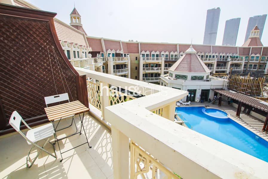 Balcony | Pool view | Cozy