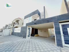 One of the most luxurious villas in Ajman, a villa with a modern stone face, with a hotel design