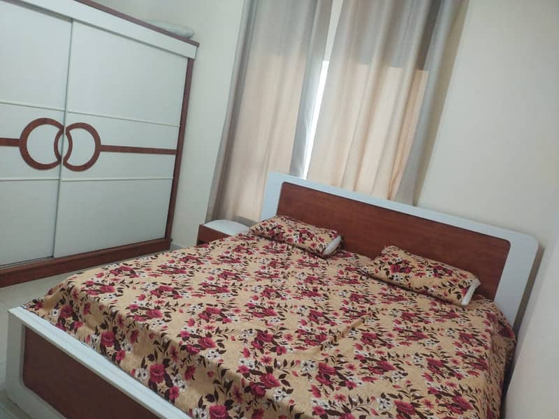 Sharjah Al-Taawun Al-Imdad Building, one room and a hall, the price is 3300,