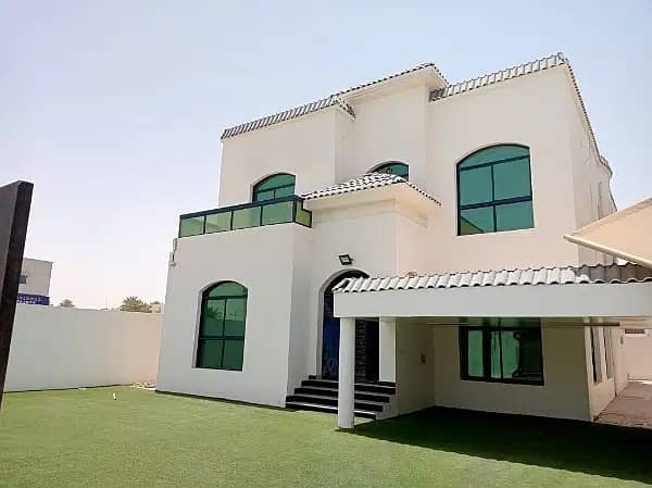 Villa for sale in Ajman Al Mowaihat residential commercial area of 5 thousand feet with electricity