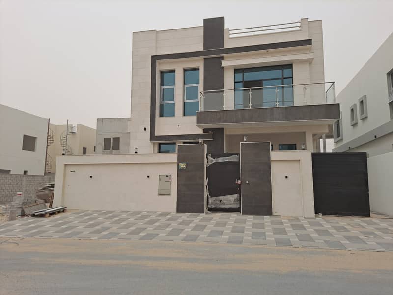 For sale, one of the most luxurious villas in Ajman, with a hotel design and super deluxe finishing, with the possibility of bank financing without do