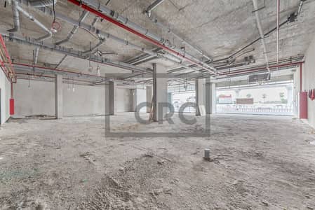 Showroom for Rent in Deira, Dubai - Main Road Facing | Near to Metro | Brand New