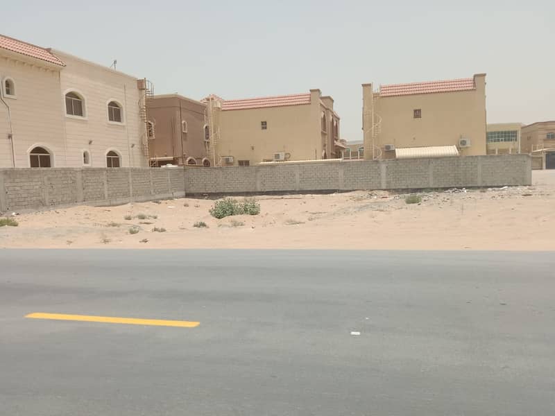 For sale residential commercial land on the hill street and the permit rail G+2 in Al Rawda 2