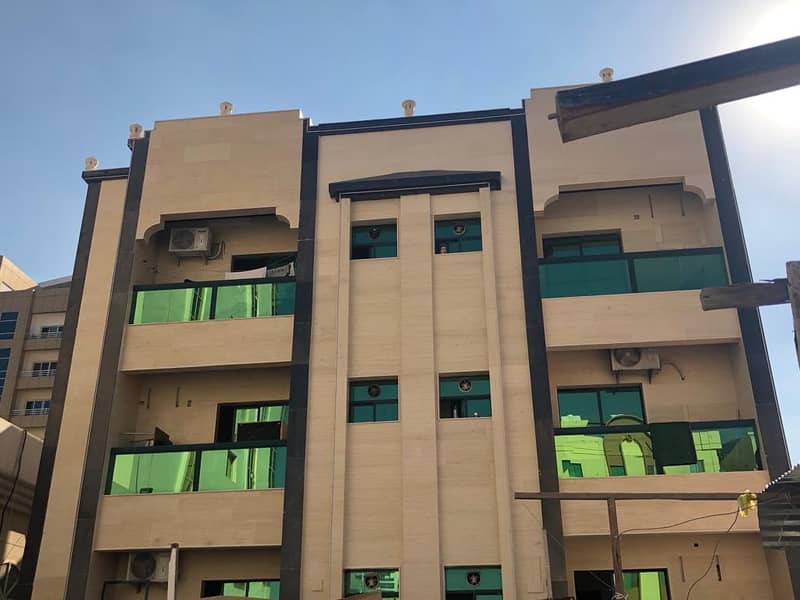 Building for sale in Ajman city center, excellent specifications, fully stoned