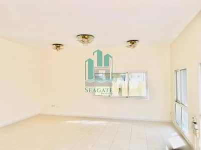 Spacious and Bright 4 bedroom plus maid independent villa with private garden in  Umm Suqem 2