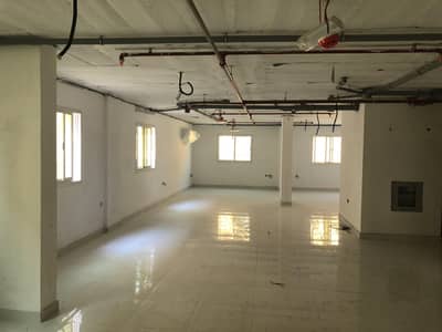 Office for Rent in Al Rawda, Ajman - For rent a large open space office, new building, Al Rawda area