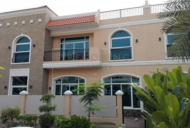Modern five bed Jumeirah 2 compound villa with pool and gym