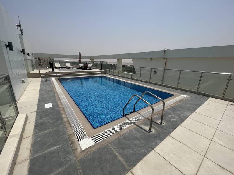 For rent an apartment of two rooms, a hall, three bathrooms, a swimming pool and a gym in Khalifa City A