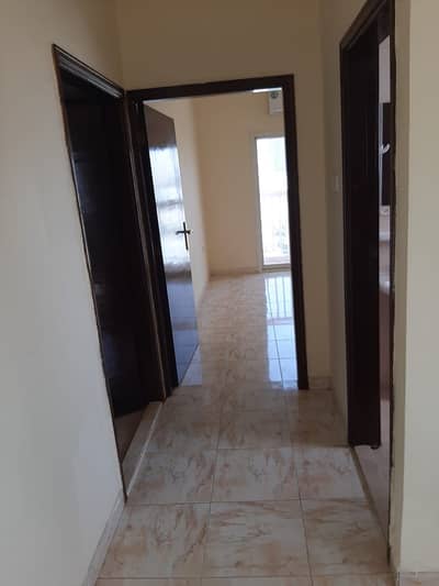 2 Bedroom Flat for Rent in Al Rashidiya, Ajman - Apartment with two rooms and a hall, excellent location, large areas and luxe finishing