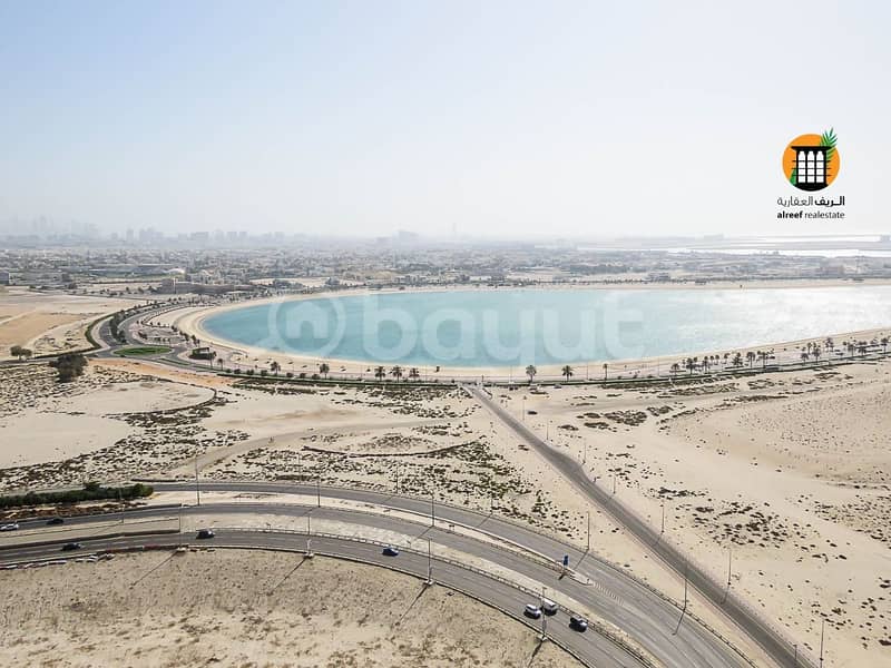 Apartment for sale 3 rooms and a hall Majestic Tower 2 Overlooking Lake Mamzar Sharjah -28th floor