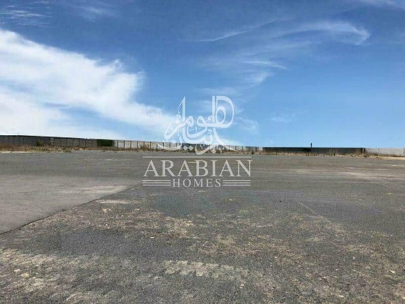 16,000Sq. m Open Land with Covered Boundary Wall for Rent!