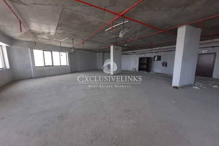Office for Rent in Motor City, Dubai - Huge Shell & Core Office | 5 Parking Spaces