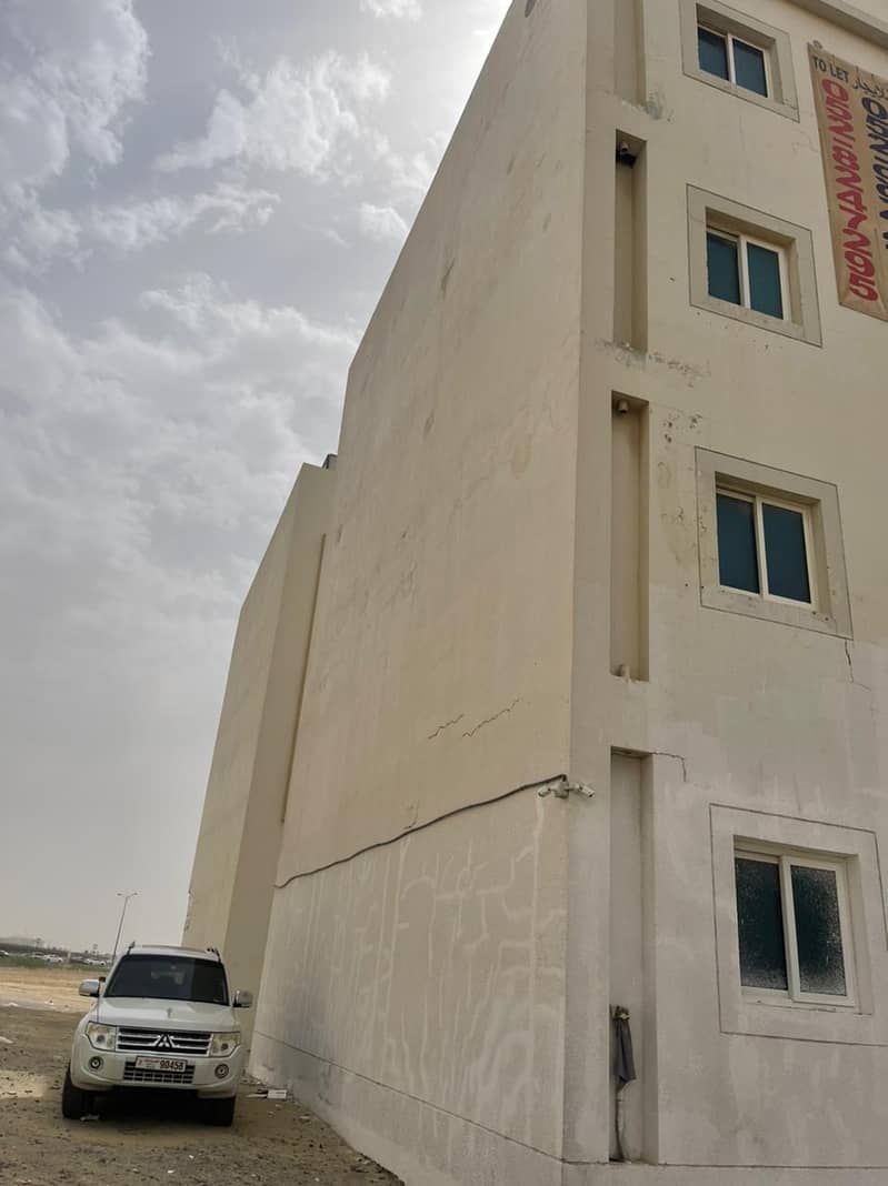 BUILDING FOR SALE IN VERY NICE LOCATION CLOSED TO SHARJAH UNIVERSITY WITH GOOD INCOME 2.6 WITH SPLIT