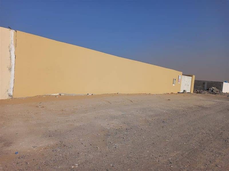10000/SQFT YARD FOR RENT IN SAJAA IND WITH BOUNDRY WALL WATER AND ELECTRICITY FOR RENT